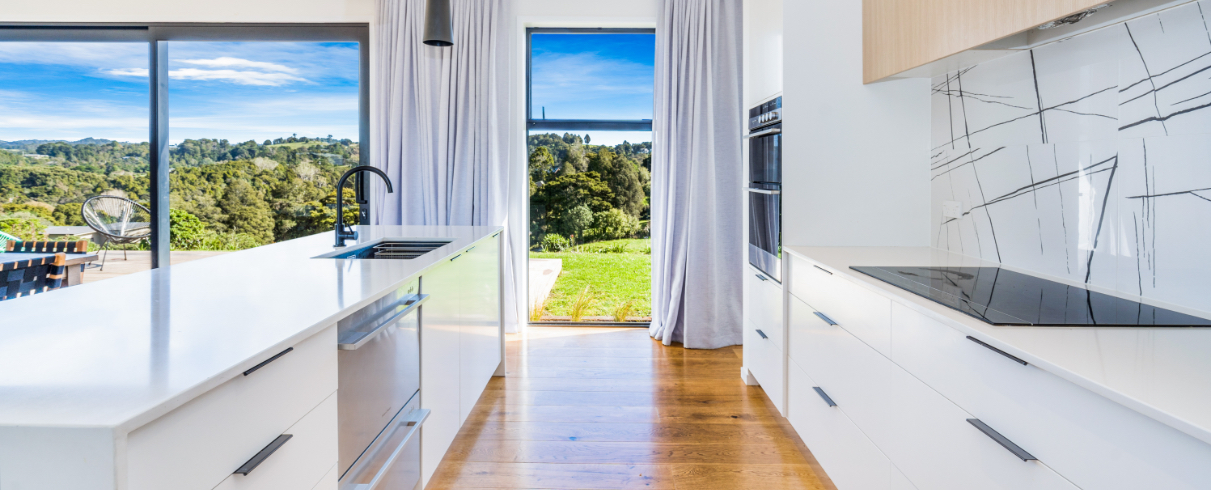 modern kitchen with view over surrounding country - New Builds Whangarei - Fieldhouse Builders